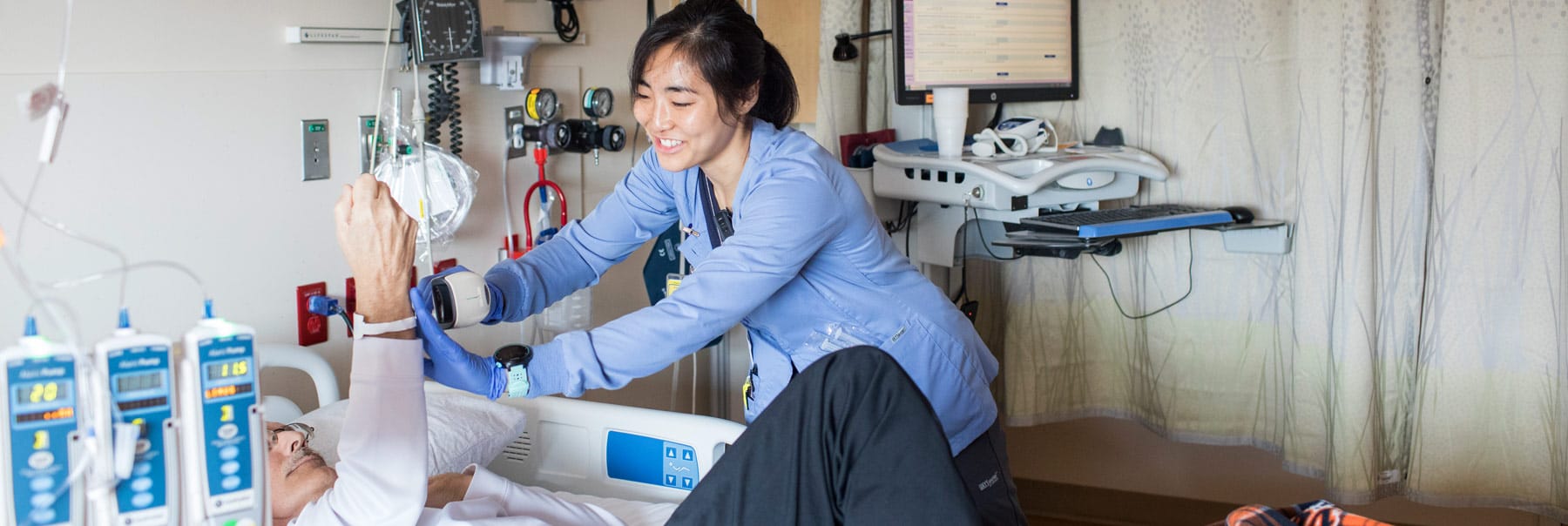 Grace Kanzawa assisting a patient